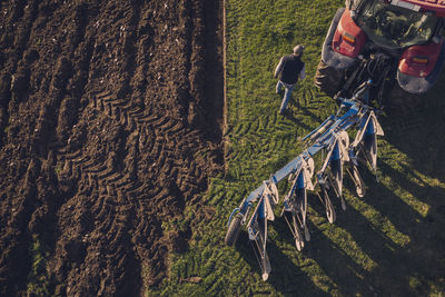 Tractor plowing field