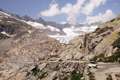 Panoramic view of snowcapped mountains against sky