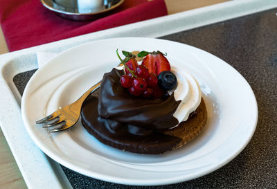 Close-up of cake in plate on table