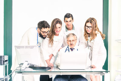 Group of people using smart phone