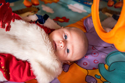 Portrait of smiling girl lying down