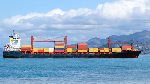 Pier over sea against sky