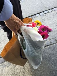 High angle view of man working at flower