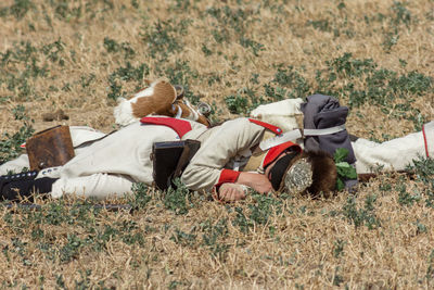 Man lying on field