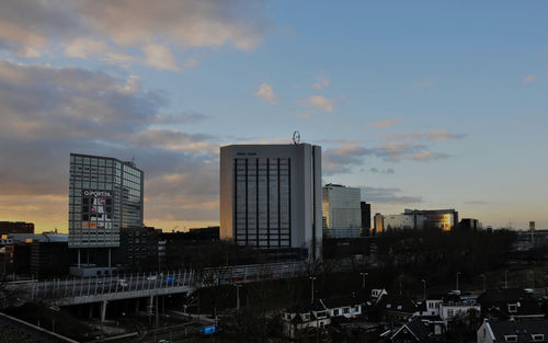 High angle view of buildings against sky during sunset