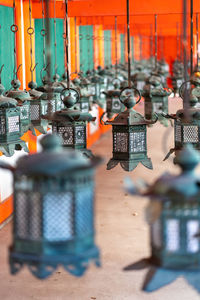 Close-up of lantern hanging on table