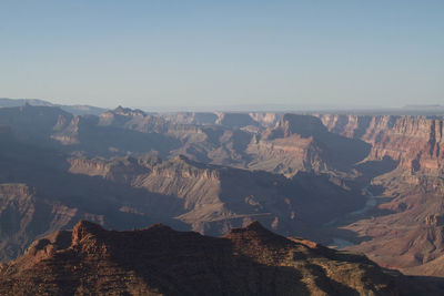 Scenic view of rocky mountains against clear sky at grand canyon national park