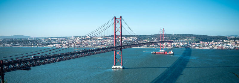 View of suspension bridge over sea