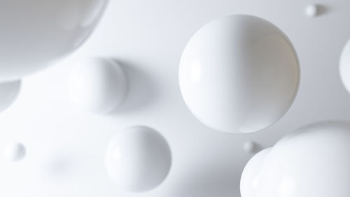 Close-up of balloons against white background