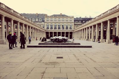 People in front of building