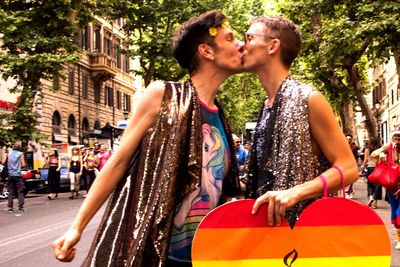 Young couple kissing in city