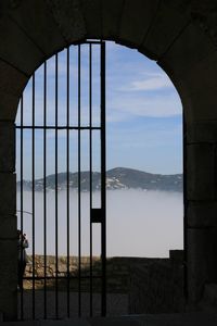Scenic view of mountains seen through window