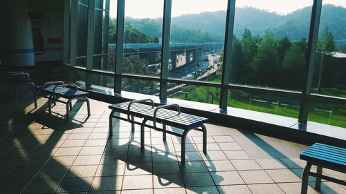 Empty chairs and table in cafe