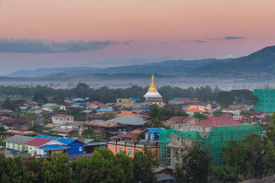 High angle view of townscape against sky at sunset