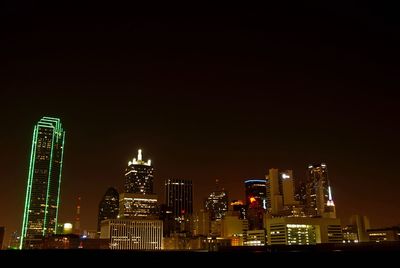 Skyscrapers in city at night