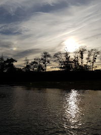 Scenic view of lake during sunset