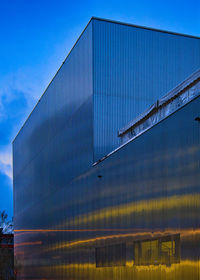 Low angle view of modern building against sky