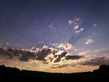 Scenic view of silhouette landscape against sky during sunset