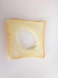 Close-up of cake against white background