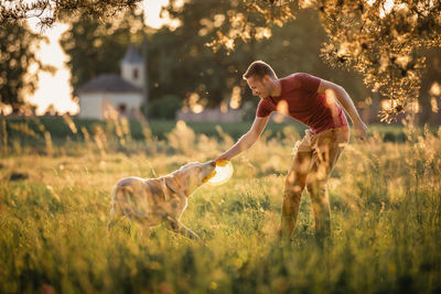 Dog running on field