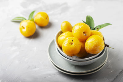 High angle view of fruits in plate on table