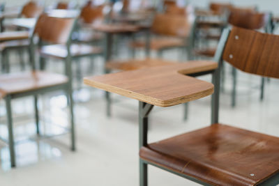 Empty chairs and table in cafe