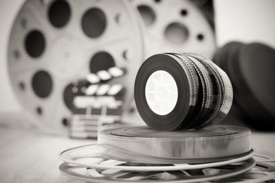 Close-up of reel and wheel rims on hardwood floor