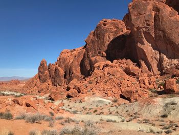 Low angle view of rock formation against clear sky