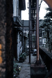 Narrow lane amidst buildings in city