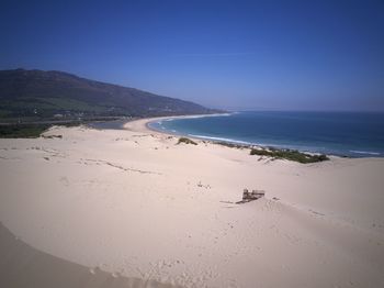 Scenic view of beach against sky