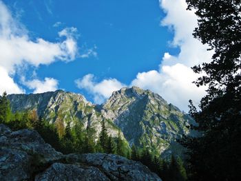 Low angle view of rocks against sky