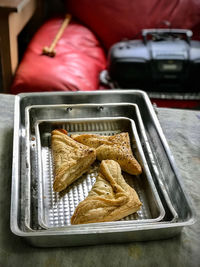 High angle view of meat in box on table