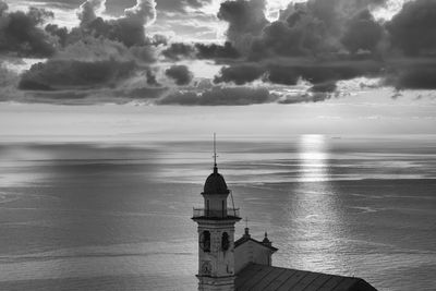 View of sea against cloudy sky, liguria, italy