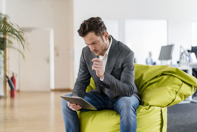 Young man using mobile phone