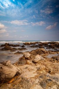 Scenic view of beach against sky