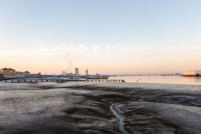 View of beach at sunset