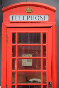 Close-up of red telephone booth