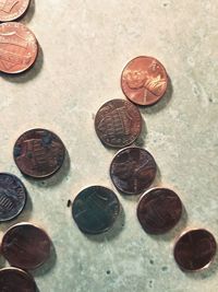 Close-up of coins on table