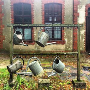 Close-up of clothes hanging on metal