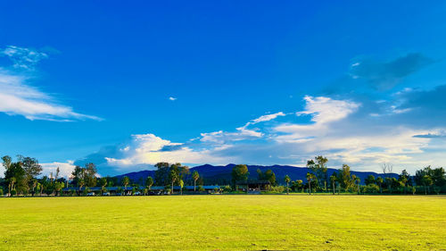 Panoramic view of townscape against blue sky