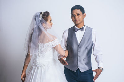 Young couple standing outdoors