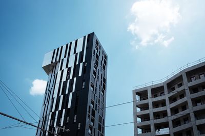 Low angle view of modern building against sky