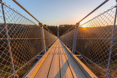 Bridge against sky during sunset