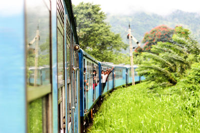 Close-up of train against sky