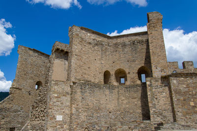 Low angle view of historical building against sky