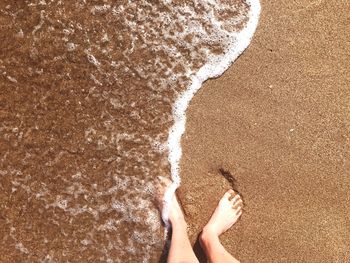 Low section of person on beach