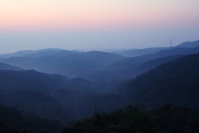 Scenic view of mountains during foggy weather