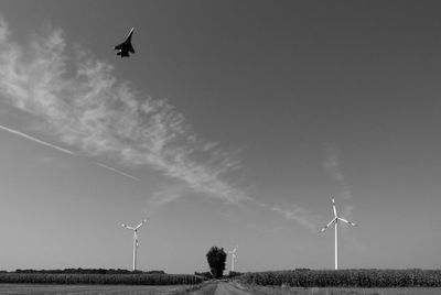 Low angle view of wind turbine against sky