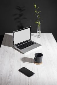 Close-up of laptop on table