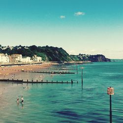 Scenic view of sea against clear blue sky